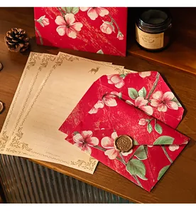 Vintage red floral stationery set with elegant envelopes and kraft writing paper