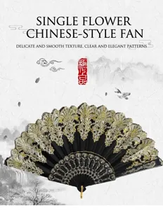 Detailed view of an ornate black folding fan featuring intricate gold embroidery patterns