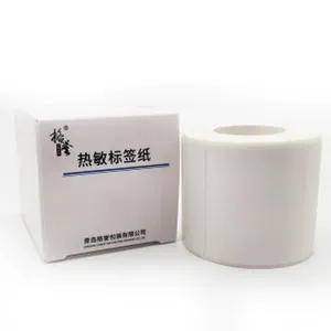 Detail view of blank white thermal label paper roll with its original packaging box