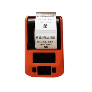 Close-up of waterproof thermal label being printed by a handheld device