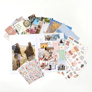 Complete vision board kit featuring inspirational quote stickers and DIY collage materials