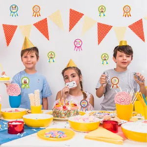 Happy Birthday badge stickers decorating a colorful kids party scene with cake and treats