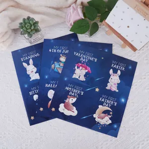 A full set of baby milestone stickers with various animal illustrations on starry backgrounds.