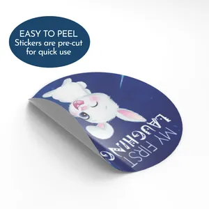 Detail macro view of pre-cut baby milestone sticker with cute rabbit and laughing text