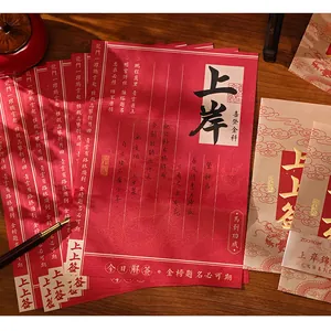 Macro view of Chinese calligraphy stationery set with inspirational red letter paper