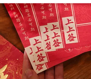 Close-up of Chinese style red blessing bookmark cards with handwritten calligraphy