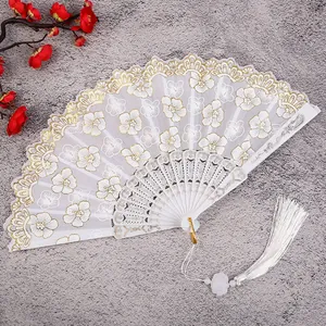 Traditional Chinese folding fan with gold floral embroidery, white tassel and jade pendant for Hanfu.
