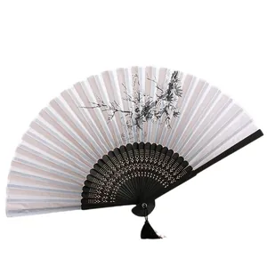 Chinese folding fan with plum blossom print, black carved ribs and tassel for dance.