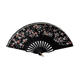 Elegant black folding fan for women featuring delicate red and white cherry blossom prints.