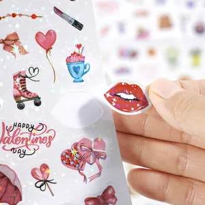 Close-up showing the holographic effect of peeling a laser sticker for scrapbooking