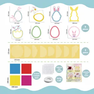 Comprehensive DIY window suncatcher craft kit for kids with rabbit and egg paper cutouts.