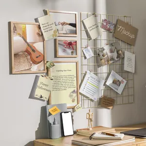 Detail shot of a vision board kit with inspirational cards on a desk and wall