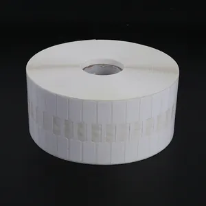 Roll of white thermal jewelry labels with dumbbell shape for price tagging