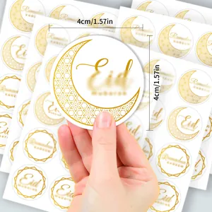 Detailed macro view showing the 4cm diameter of gold foil Eid Mubarak moon stickers