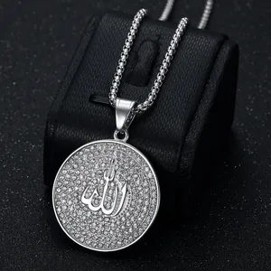 Macro detail of hip hop religious Allah pendant necklace with sparkling rhinestones