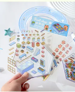 Nahaufnahme der transparenten Capybara-Sticker für das Scrapbooking-Obstladen-Set