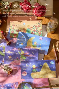 Detail showing The Little Prince oil painting style envelopes and vintage stationery set