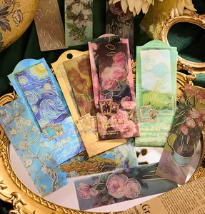 Macro detail view of gold-stamped PVC bookmarks with Van Gogh style floral patterns.