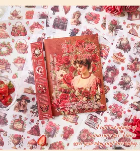 Detail of vintage sticker book featuring rose and girl illustrations for scrapbooking