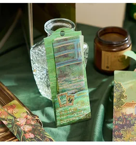Close-up of gold-stamped floral PVC bookmarks in Dreamy Island series packaging