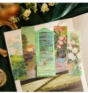 Close-up of vintage impressionist floral and landscape PVC bookmarks with gold foil details