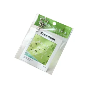 Green PET reversal film keychain with star clasp, minimalist bag pendant design
