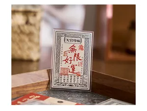 Macro detail of acrylic fridge magnet with traditional Chinese silver note design