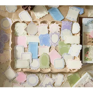 Close-up of vintage embossed frame memo paper stickers in various shapes for journaling