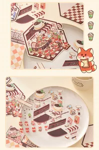 Detail view of cute fox and coffee shop PET stickers sheet laid out on a white plate