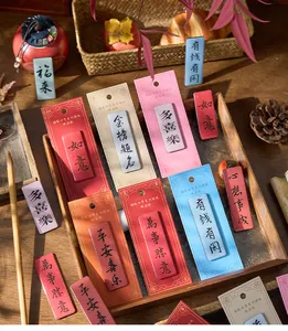 Detailed view of Chinese blessing magnets with traditional calligraphy and glue finish