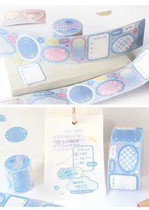 Detail of pastel die-cut writable deco tape applied to a notebook page for journaling