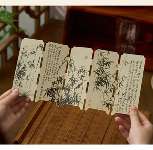 Close-up of Chinese style folding bookmark with traditional ink bamboo painting