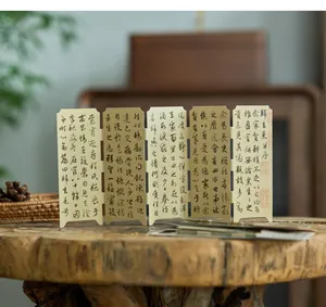 Detailed view of Chinese style mini folding screen bookmark with ancient calligraphy