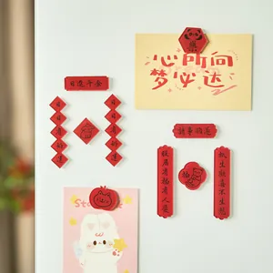 Set of red acrylic refrigerator magnets with traditional Chinese calligraphy couplets