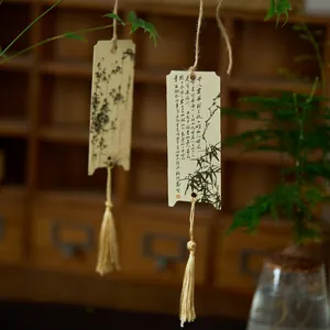 Traditional Chinese ink wash bamboo bookmarks featuring elegant golden tassels and calligraphy
