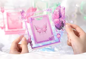 Detailed macro view showing the translucent butterfly acrylic spinning card frame ornament