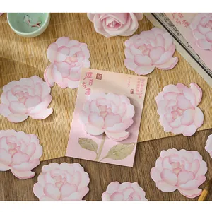 Close-up of pink peony floral shaped sticky notes in traditional Chinese style