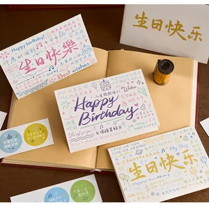 Detailed view of birthday greeting card set with handwritten style illustrations