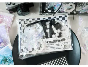 Detailed view of DIY Ita-bag kit including lace, ribbons, and decorative pearls for crafting.