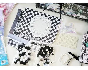 Detail view of DIY Ita-bag material kit with lace, stickers, and pearls
