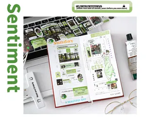 Detail view of Mist Island Evening Song journaling stickers applied in a green-themed diary