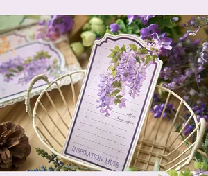 Detailed macro view of floral wisteria illustration on artistic paper memo tag