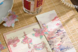 Vue détaillée d'autocollants laser PET avec feuille d'or pour scrapbooking créatif décoratif
