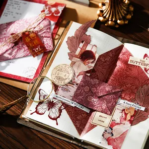 Vintage Scrapbook-Materialpaket mit Schmetterlingsmotiven, Aufklebern und Briefumschlägen