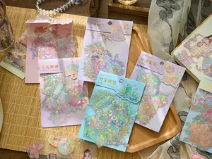 Différents modèles d'autocollants PET holographiques dorés à chaud pour scrapbooking