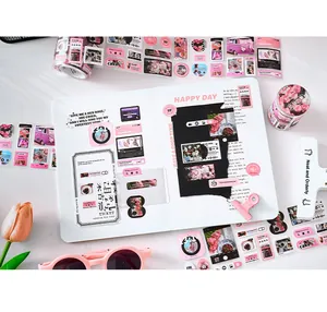 Korean ins style DIY scrapbooking stickers and pink Washi tape on a journal notebook