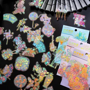Vue macro détaillée d'autocollants holographiques en PET avec dorure pour le scrapbooking