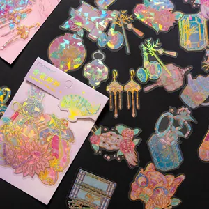 Vue détaillée d'autocollants PET laser dorés de style chinois pour le scrapbooking