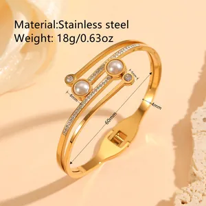 Elegant gold stainless steel bangle with pearls and crystals geometric design for women