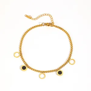 Detailed view of a gold stainless steel chain with black Roman numeral charms.